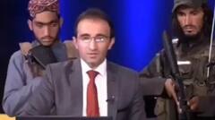 'Public Should Not Be Afraid': Afghanistan News Anchor Surrounded By Armed Taliban Broadcasts Message