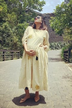 Mom-To-Be Neha Dhupia Flaunts Baby Bump While Basking In Sun; See Pics