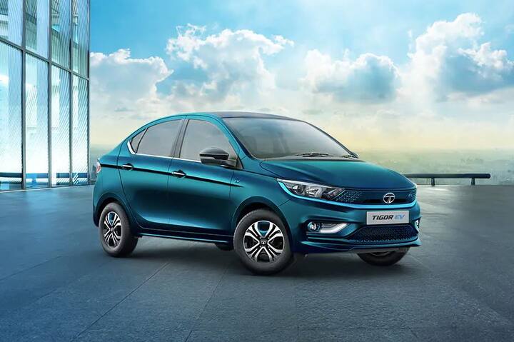 ਇਹ ਰੇਂਡ ਹੋਵੇਗੀ ਕੰਪਨੀ ਨੇ Tata Tigor EV ਵਿੱਚ ਦੋ ਡਰਾਈਵਿੰਗ ਮੋਡ ਦਿੱਤੇ ਹਨ, ਇਨ੍ਹਾਂ ਵਿੱਚ ਡਰਾਈਵ ਅਤੇ ਸਪੋਰਟਸ ਮੋਡ ਸ਼ਾਮਲ ਹਨ। ਕੰਪਨੀ ਦਾ ਦਾਅਵਾ ਹੈ ਕਿ ਲੋ-ਰੇਜਿਸਟੇਂਸ ਵਾਲੇ ਟਾਇਰਾਂ ਨਾਲ ਡਰਾਈਵਿੰਗ ਅਨੁਭਵ ਨੂੰ ਹੋਰ ਵੀ ਬਿਹਤਰ ਬਣਾਉਂਦਾ ਹੈ। ਇਸ ਇਲੈਕਟ੍ਰਿਕ ਕਾਰ ਨੂੰ ਸਿੰਗਲ ਚਾਰਜ 'ਤੇ 306 ਕਿਲੋਮੀਟਰ ਤੱਕ ਚਲਾਇਆ ਜਾ ਸਕਦਾ ਹੈ। ਹਾਲਾਂਕਿ, ਇਹ ਡ੍ਰਾਇਵਿੰਗ ਰੇਂਜ ਸੜਕ ਆਵਾਜਾਈ, ਸਥਿਤੀ ਅਤੇ ਤੁਸੀਂ ਇਸਨੂੰ ਕਿਵੇਂ ਚਲਾਉਂਦੇ ਹੋ ਇਸ ਤੇ ਨਿਰਭਰ ਕਰਦੀ ਹੈ।