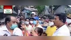 Vaccination Chaos: ভ্যাকসিনের জন্য ভিড়, ঠিকমতো লাইনে না দাঁড়ালে টিকা পাওয়া যাবে না, আঙুল উঁচিয়ে হুমকি তৃণমূল নেত্রীর স্বামীর, ভাইরাল ভিডিও | Bangla News