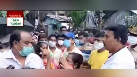 Vaccination Chaos: ভ্যাকসিনের জন্য ভিড়, ঠিকমতো লাইনে না দাঁড়ালে টিকা পাওয়া যাবে না, আঙুল উঁচিয়ে হুমকি তৃণমূল নেত্রীর স্বামীর, ভাইরাল ভিডিও | Bangla News
