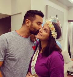 AWWDORABLE! Mom-to-be Neha Dhupia Gets A Kiss From Her Baby Daddy Angad Bedi; Inside Pics From Her Surprise Baby Shower
