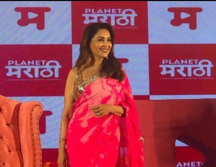 The actress opted for a beautiful pink sari for the launch and looked stunning like always.