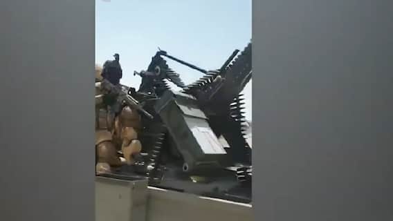 Taliban holds victory parade with American weapons