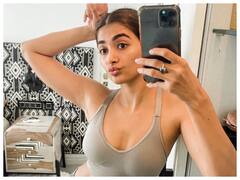 Pooja Hegde ने शेयर की मिरर सेल्फी, खूबसूरती से फ्लॉन्ट कर रही हैं Toned Midriff, देखें उनकी तस्वीरें