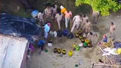 Fatehpur: आबकारी और पुलिस की ड्रोन से छापेमारी, भारी मात्रा में शराब बनाने का जखीरा बरामद