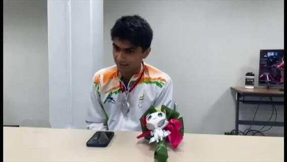 Which line of PM Modi kept boosting Noida DM Suhas' morale?