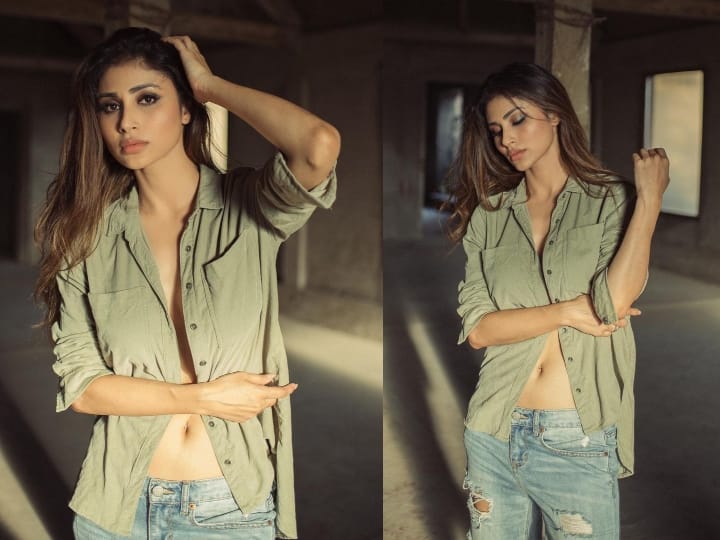 बॉलीवुड एक्ट्रेस मौनी रॉय (Mouni Roy) अपने लुक्स और स्टाइल की वजह से अक्सर सुर्खियों में रहती हैं. हाल ही में उन्होंने इंस्टाग्राम पर बेहद खूबसूरत तस्वीरें शेयर की हैं. इन तस्वीरों में मौनी ओपन शर्ट और रिप्ड जीन्स में नजर आ रही हैं. सोशल मीडिया पर उनकी ये तस्वीरें तेजी से वायरल हो रही हैं. नीचे की स्लाइड में देखें उनकी ये खास तस्वीरें.