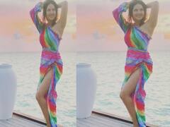 Sunny Leone Photos: सोने की बेबी डॉल हुई सतरंगी, समंदर किनारे इंद्रधनुष के रंगो में रंगी दिखीं सनी लियोन
