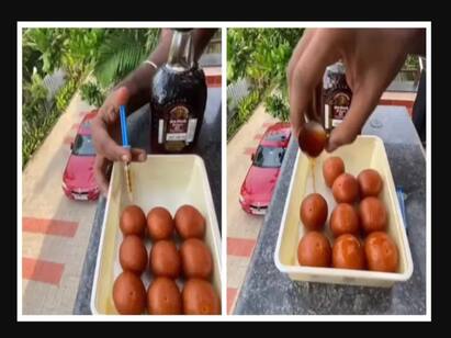 Video of man injecting old monk inside gulab jamun goes viral in internet ‛என்ன ஒரு ரசனை...’ குலாப் ஜாமுனுக்கு’ ஓல்ட் மாங்க்’  தடுப்பூசி! வைரல் வீடியோ!