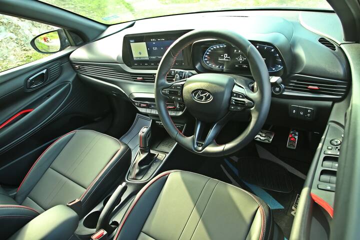 Inside, it is as well equipped as a standard i20 but the N Line packs in more features as standard equipment like a sunroof, sporty seats with N logo and more. The feature list also includes wireless charging, 10.25-inch screen, steering paddle shifters for the DCT variant, connected tech, Bose audio system etc. New to the N Line are the voice recognition commands to open the sunroof and more plus OTA map updates.