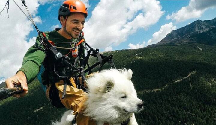 dog owner and his dog paragliding together video goes viral Video Viral: પોતાના માલિક સાથે કૂતરાએ કરી પેરાગ્લાઈડિંગ, લોકોને ખૂબ ગમ્યો આ વીડિયો