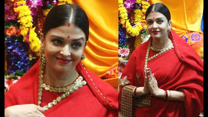 इसके साथ ही सामने आई तस्वीरों में आप देख सकते हैं कि ऐशवर्या राय सुर्ख साड़ी, सिंदूरी मांग और लाल बिंदी में किसी नई नवेली दुल्हन की तरह ही दिखाई दे रही थीं.