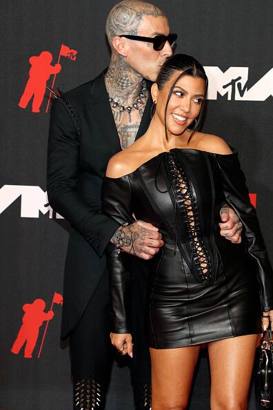 Musician Travis Barker and his girlfriend Kourtney Kardashian made their MTV VMAs debut as couple and the two were quite affectionate in front of the cameras. [gettyimages]