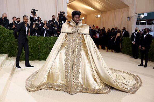 22-year-old LNX wore three separate but coherent looks designed by Versace. He first donned a regal golden velvet robe. [pic credit: Gettyimages]
