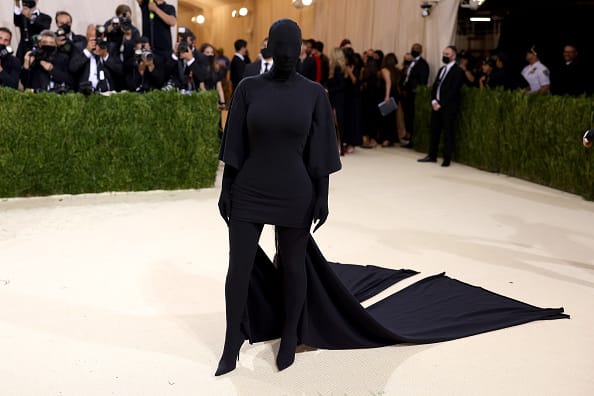 Kim Kardashian surprised everyone as she wore head to toe black in a gown and facemask by Balenciaga.[pic credit: Gettyimages]
