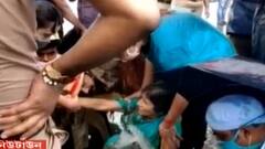 New Town: নিউটাউনে জমা জলে বিপত্তি, ম্যানহোলে পড়ে আটকে গেলেন মহিলা | Bangla News