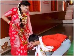 Viral Video: दुल्हन के पैर छूकर दूल्हे ने लिया आर्शीवाद, वायरल वीडियो को देख लोग बोले- 'दिल जीत लिया'