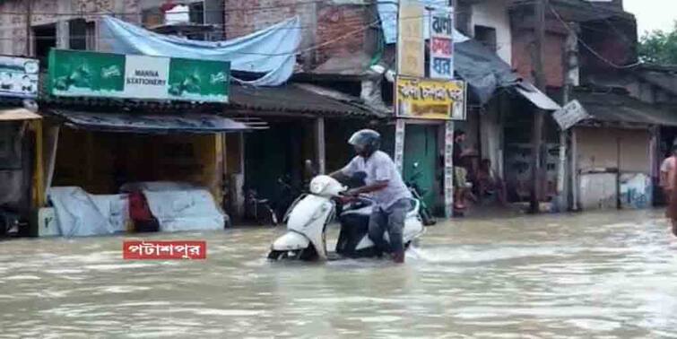 West Midnapore Torrential Rain Keleghai River Dam Broken, Patashpur Flooded West Midnapore : টানা বৃষ্টিতে লণ্ডভণ্ড পশ্চিম মেদিনীপুরের একাংশ, কেলেঘাই নদীর বাঁধ ভেঙে প্লাবিত পটাশপুর