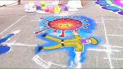 Ganesh Visarjan 2021 : कोरोनाच्या तिसऱ्या लाटेबाबत रांगोळीतून जनजागृती, रंगांच्या माध्यमातून अनोखा संदेश