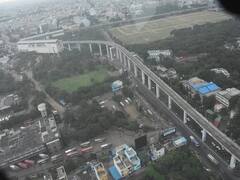 Photos: నిమజ్జనం వేళ Hyd విహంగ వీక్షణం, మెట్రో ఒంపుసొంపులతో అందమైన సిటీని పైనుంచి చూడండి