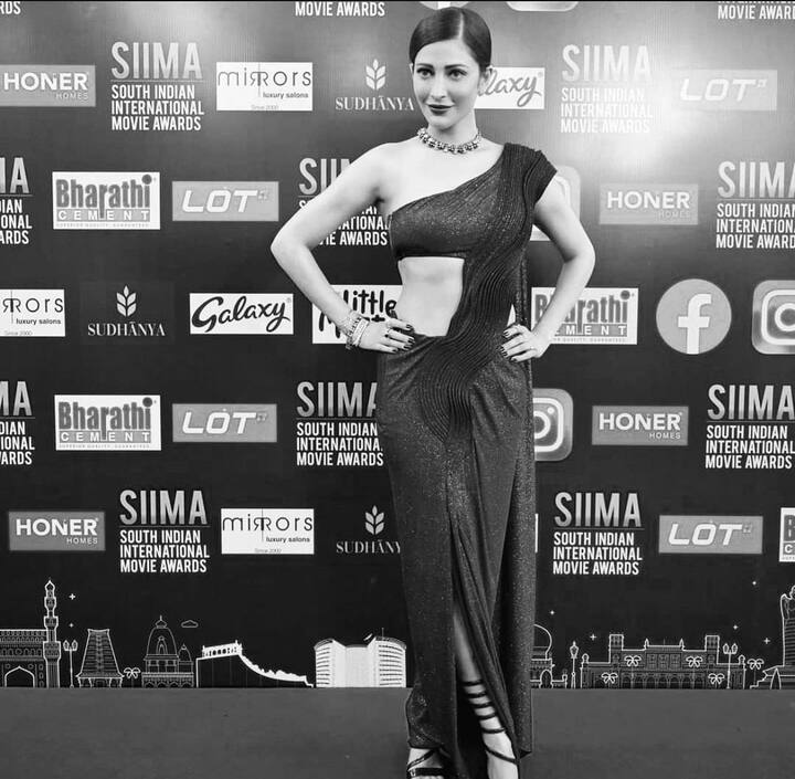 The ‘Gabbar Is Back’ actress accessorized her look with a single line necklace, rings and bracelets. She tied up her into a sleek ponytail to complete her look. (Image courtesy - @shrutzhaasan/Instagram)