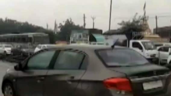 મહેસાણા: મોઢેરા ચોકડી પર ટ્રાફિક જામના દ્રશ્યો, સામાન્ય વરસાદમાં વાહનોની લાગી લાંબી કતાર