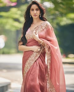Nora Fatehi जब पहनती हैं Saree, खूबसूरती में बड़ी-बड़ी हसीनाओं पर पड़ जाती हैं भारी