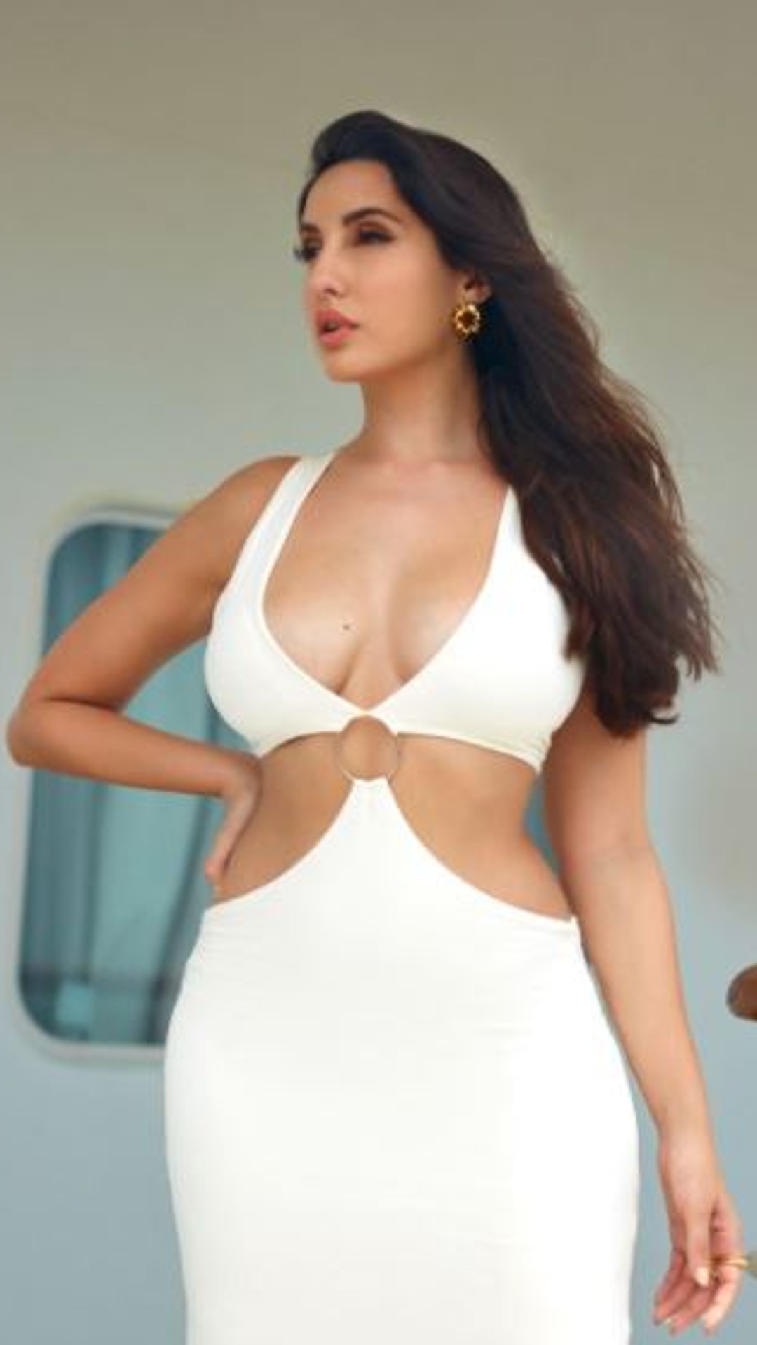 Nora Fatehi in pretty white dresses