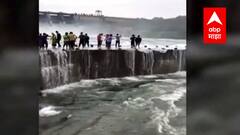 Parbhani येलदरी प्रकल्पासमोरच्या पुलावर गर्दी, ना पोलीस, ना सुरक्षारक्षकांचं लक्ष... जीव धोक्यात घातल फोटोसेशन