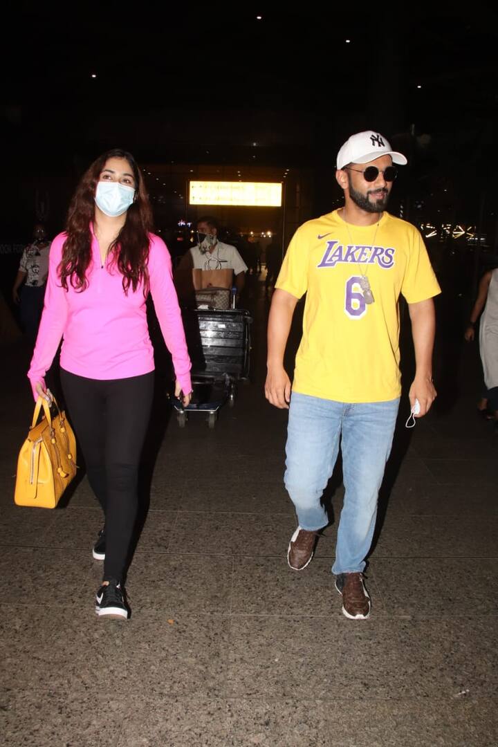 Rahul Vaidya and Disha Parmar, who have been hogging all the limelight with their honeymoon photos, returned to Mumbai after enjoying a dreamy vacation in Maldives. The couple was snapped by the paparazzi at the Mumbai airport on Sunday (September 26) upon their arrival.