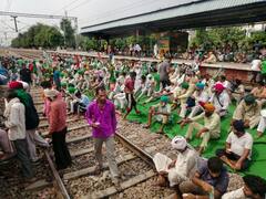Farmers Bharat Bandh: किसानों ने कई जगहों पर नेशनल हाईवे जाम किया, रेलवे लाइन पर बैठे, देखें तस्वीरें