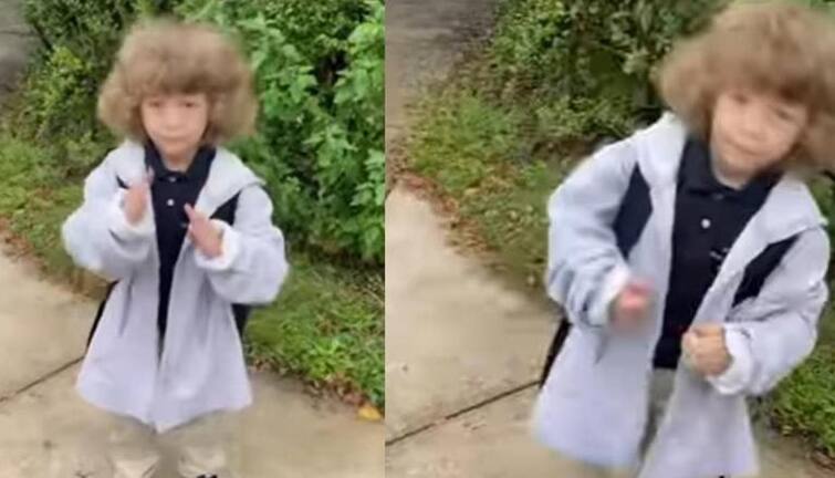 Kid turns bus stop into dance floor, sweet video wins hearts ਸਕੂਲ ਜਾਣ ਵਾਲੇ ਬੱਚੇ ਨੇ ਬੱਸ ਸਟਾਪ 'ਤੇ ਕੀਤੇ 'ਕਿਊਟ' ਡਾਂਸ ਸਟੈਪਸ, ਪਲਾਂ 'ਚ ਵਾਇਰਲ ਹੋ ਗਈ ਵੀਡੀਓ