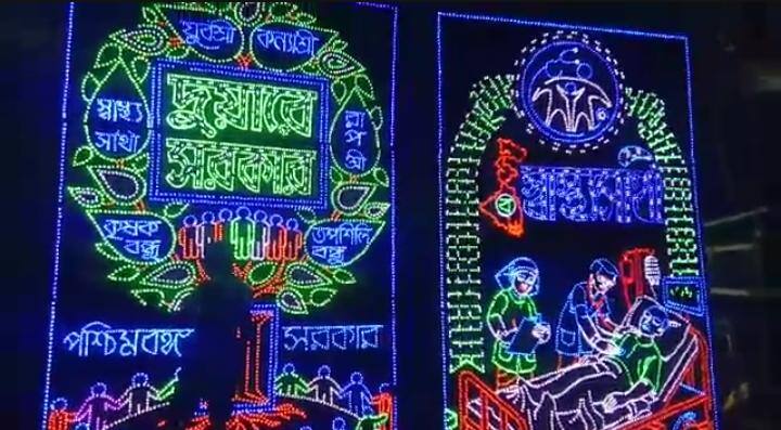 এ বছর চন্দননগরের শিল্পীদের হাত ধরে আলোকসজ্জায় উঠে এসেছে রাজ্য সরকারের বিভিন্ন প্রকল্প।