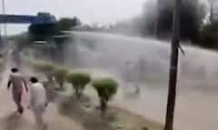 Haryana: झज्जर में विरोध प्रदर्शन कर रहे किसानों पर पुलिस ने की पानी की बौछार