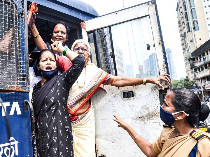 Mumbai Police detains Shiv Sena party workers during their protest at Worli junction. (PTI Photo/Shashank Parade)