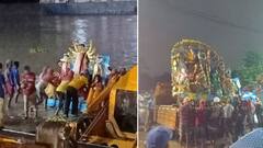 দশমীতে দোসর ঝমঝমিয়ে বৃষ্টি, জলে ভিজেই মাকে আবেগঘন বিদায় আহিরীটোলা ঘাটে