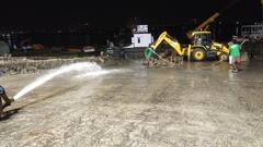 বিধি মেনে মিশল আবেগ, একাদশীর সন্ধেজুড়ে প্রতিমা বিসর্জন বাবুঘাটে