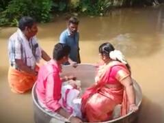Kerala Marriage: కేరళలో క్రేజీ వివాహం.. వానలు , వరదలను లెక్కచేయకుండా..