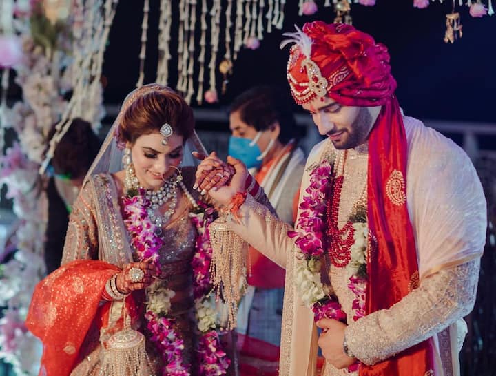The newly married couple complimented each other in traditional outfits. While Abhishek wore a sherwani, Suhani looked stunning in a bridal lehenga.