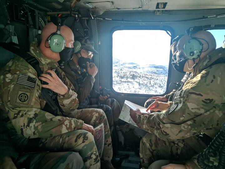 Indian and US Soldiers navigating while on board UH 60 Blackhawk helicopter during the military excercise. (Source: ANI)