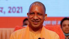 Uttar Pradesh: যোগীর সভায় রিভলভার হাতে যুবক, সাসপেন্ড চার পুলিশকর্মী| Bangla News