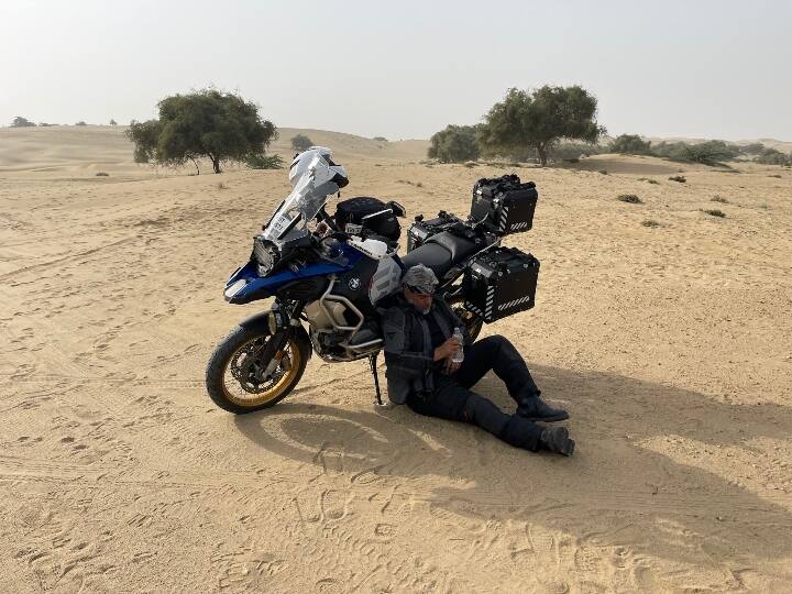 Viral: Ajith Latest bike travel Pics, Recent Photo of Actor ajithkumar from his bike trip Thar desert Ajith Latest Pic: ரைடுக்கிடையே பாலைவனத்தில் ஓய்வு - வைரலாகும் தல அஜித்தின் ஃபோட்டோ