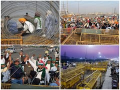 IN PICS | Delhi Police Remove Barricades From Ghazipur Protest Site, Farmers Say 'Will Go To Parliament'