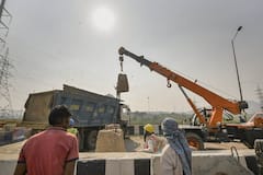 IN PICS | Delhi Police Remove Barricades From Ghazipur Protest Site, Farmers Say 'Will Go To Parliament'