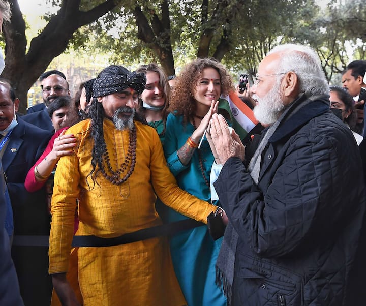 Prime Minister Narendra Modi is greeted by the local community members in Italy.(Image Source: PTI)