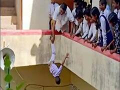 2ம் வகுப்பு மாணவனின் காலைப்பிடித்து தலைகீழாக தொங்கவிட்ட சைக்கோ ஆசிரியர்..!
