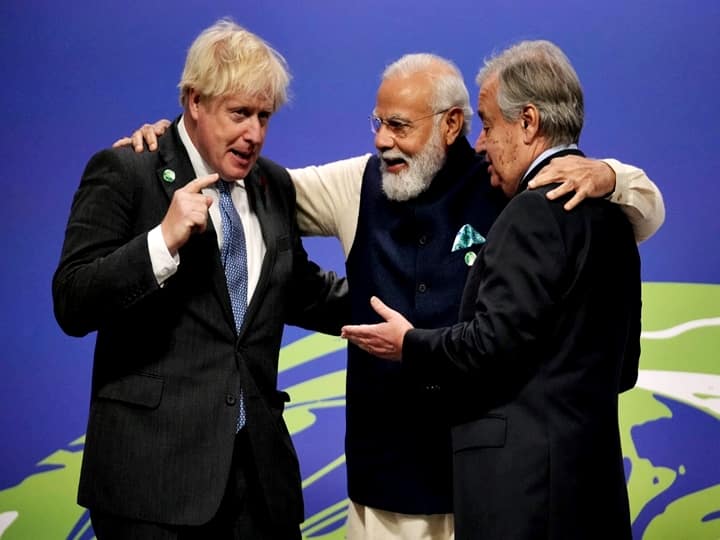 PM Modi, who arrived in Glasgow on Sunday night from Rome, was received by Johnson and UN Secretary General Antonio Guterres and was then seen interacting with them. The three leaders also attended the G20 Summit in Italy which concluded on Sunday. (Photo by Christopher Furlong / POOL / AFP)