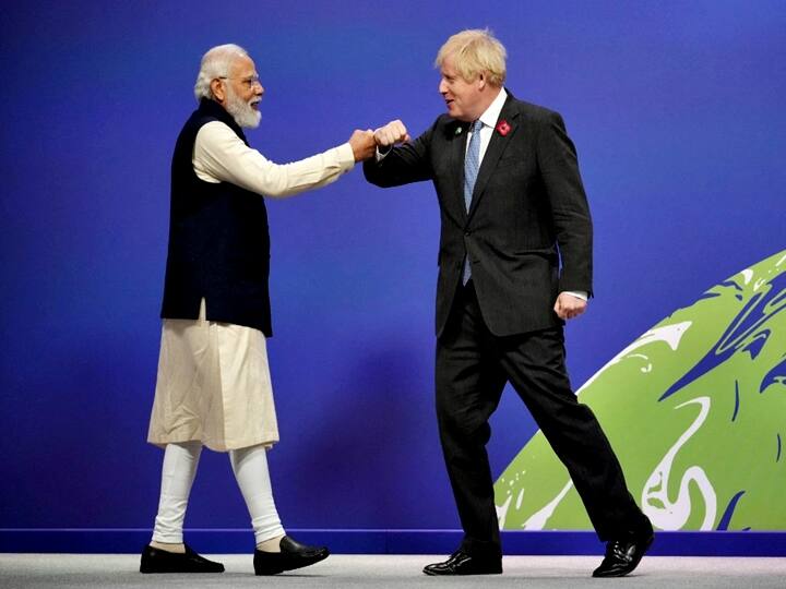 Prime Minister Narendra Modi was warmly greeted by his British counterpart Boris Johnson upon his arrival at the Scottish Exhibition Centre to attend the opening ceremony of the COP26 climate summit where he would deliver a national statement. (Photo by Christopher Furlong / POOL / AFP)