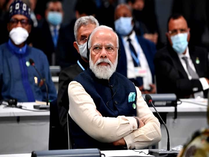 Prime Minister Narendra Modi listens to a speaker during the opening ceremony of the COP26 UN Climate Change Conference in Glasgow, Scotland on November 1, 2021. (Photo by Jeff J Mitchell / POOL / AFP